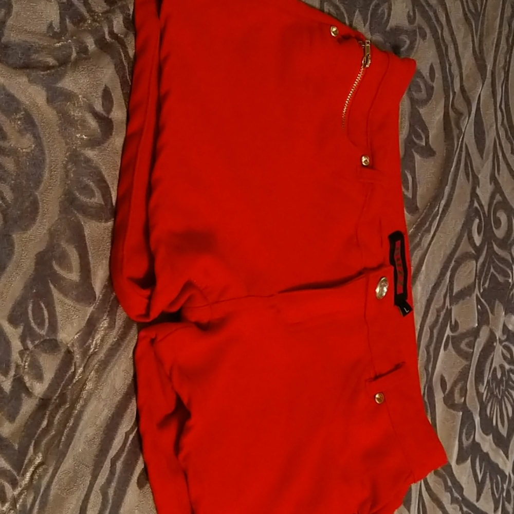 Buzz red spandex shorts with diamond button